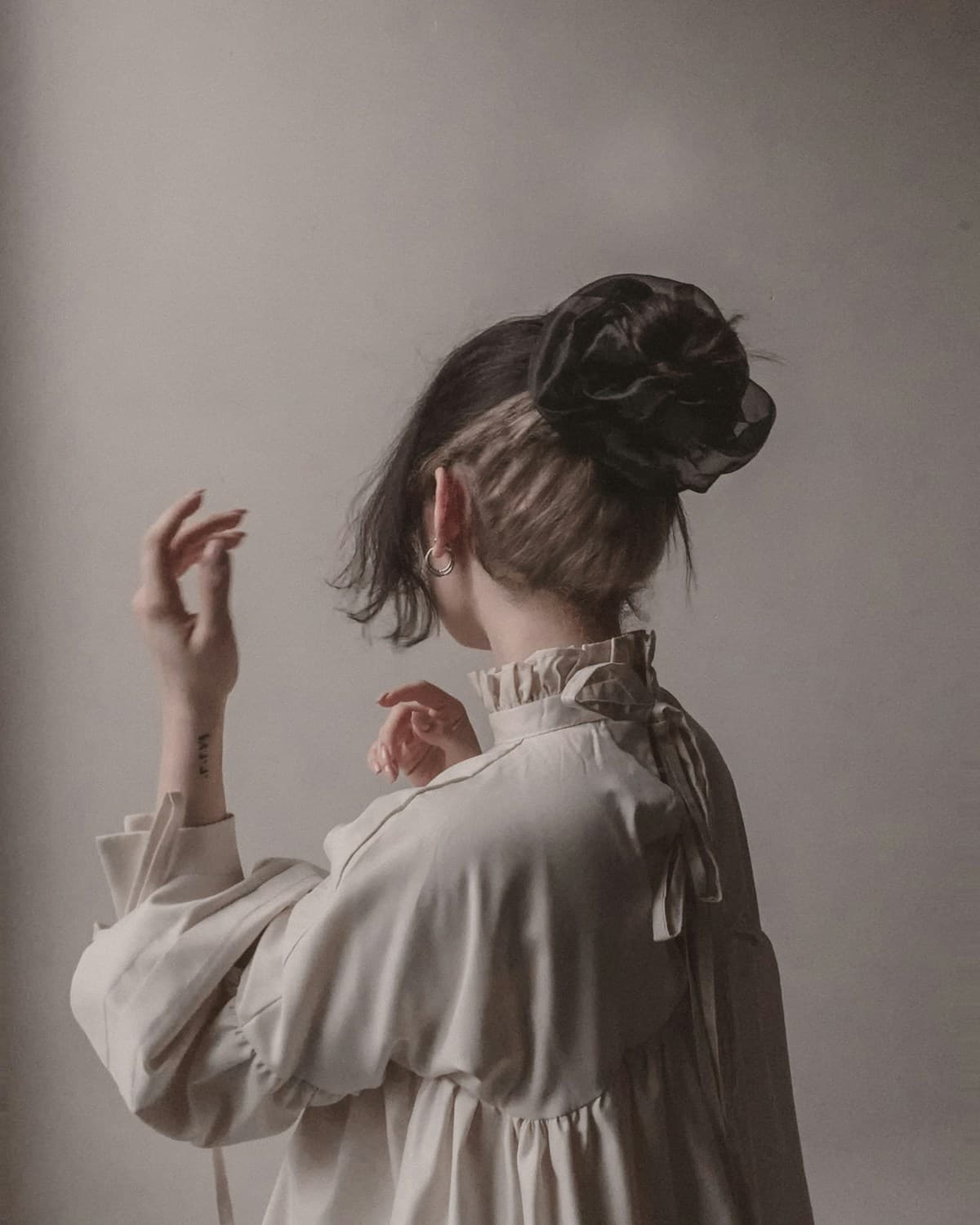 Ivory poet blouse with a softly gathered collar